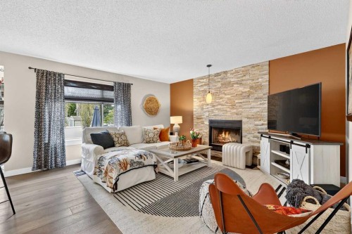 37 Shawbrooke Manor Sw, Calgary, AB - Indoor With Fireplace