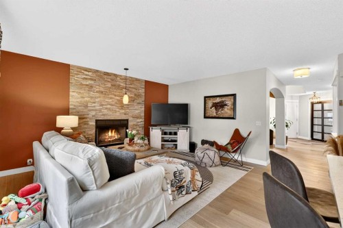 37 Shawbrooke Manor Sw, Calgary, AB - Indoor Photo Showing Living Room With Fireplace