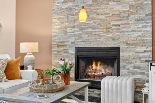 37 Shawbrooke Manor Sw, Calgary, AB - Indoor Photo Showing Living Room With Fireplace