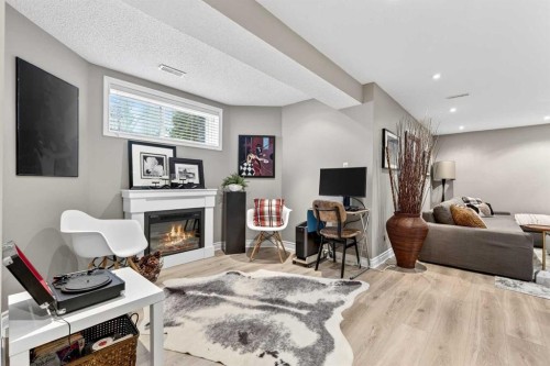 37 Shawbrooke Manor Sw, Calgary, AB - Indoor With Fireplace
