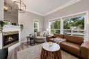 107 Mission Road Sw, Calgary, AB  - Indoor Photo Showing Living Room With Fireplace 