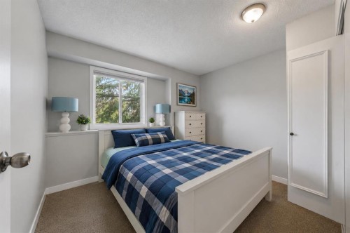 107 Mission Road Sw, Calgary, AB - Indoor Photo Showing Bedroom