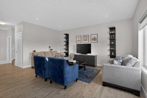 42 Baysprings Way Sw, Airdrie, AB - Indoor Photo Showing Living Room