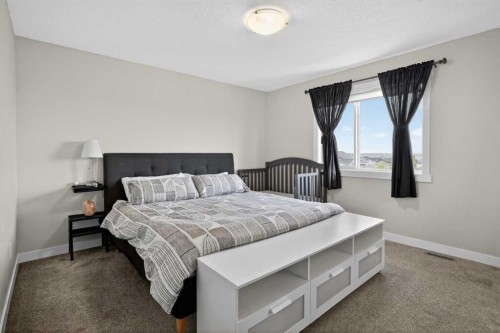 42 Baysprings Way Sw, Airdrie, AB - Indoor Photo Showing Bedroom