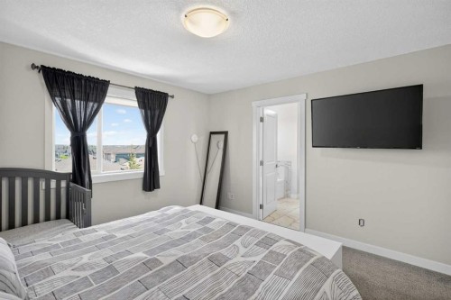 42 Baysprings Way Sw, Airdrie, AB - Indoor Photo Showing Bedroom