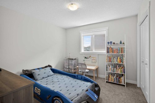42 Baysprings Way Sw, Airdrie, AB - Indoor Photo Showing Bedroom