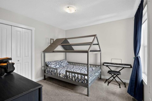 42 Baysprings Way Sw, Airdrie, AB - Indoor Photo Showing Bedroom