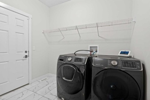 42 Baysprings Way Sw, Airdrie, AB - Indoor Photo Showing Laundry Room