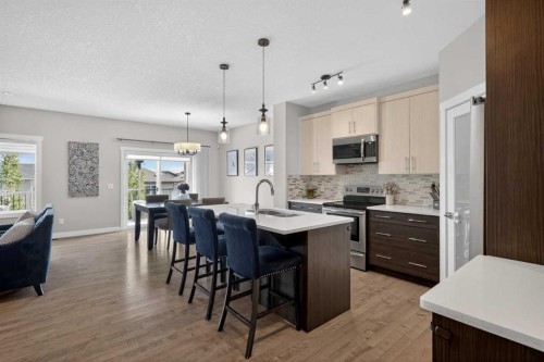 42 Baysprings Way Sw, Airdrie, AB - Indoor Photo Showing Kitchen With Upgraded Kitchen