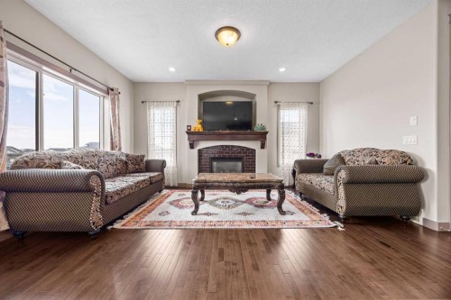 282 Pantego Terrace Nw, Calgary, AB - Indoor Photo Showing Living Room With Fireplace