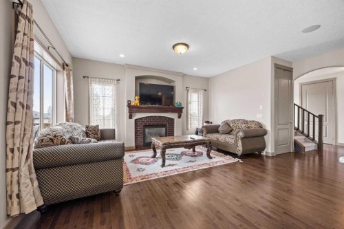 282 Pantego Terrace Nw, Calgary, AB - Indoor Photo Showing Living Room With Fireplace