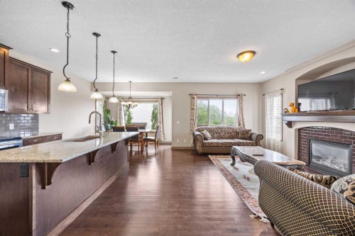 282 Pantego Terrace Nw, Calgary, AB - Indoor Photo Showing Other Room With Fireplace