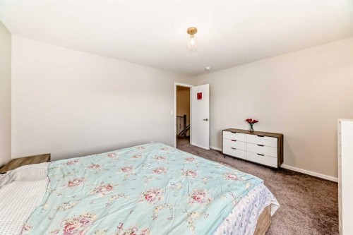 131 Carringham Road Nw, Calgary, AB - Indoor Photo Showing Bedroom