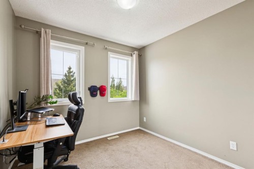 943 Windsong Drive Sw, Airdrie, AB - Indoor Photo Showing Office