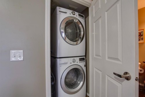 943 Windsong Drive Sw, Airdrie, AB - Indoor Photo Showing Laundry Room