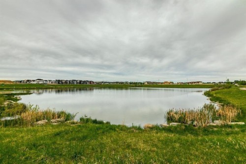 943 Windsong Drive Sw, Airdrie, AB - Outdoor With Body Of Water With View