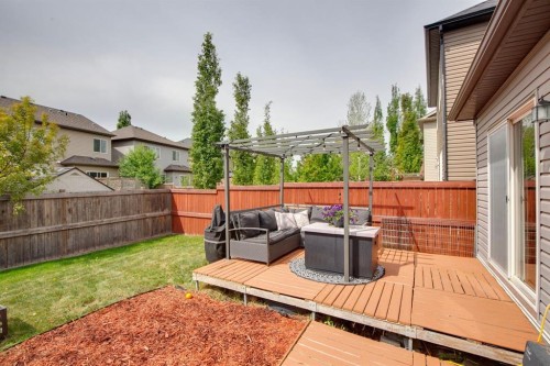 943 Windsong Drive Sw, Airdrie, AB - Outdoor With Deck Patio Veranda