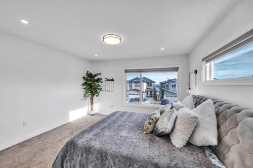 97 Baysprings Gardens Sw, Airdrie, AB - Indoor Photo Showing Bedroom