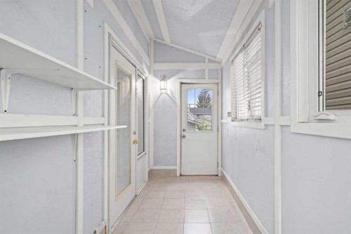 107 Tararidge Close Ne, Calgary, AB - Indoor Photo Showing Other Room