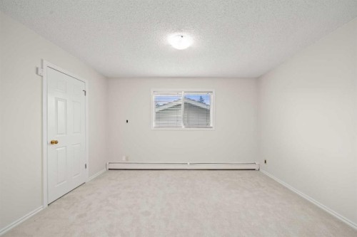 107 Tararidge Close Ne, Calgary, AB - Indoor Photo Showing Other Room