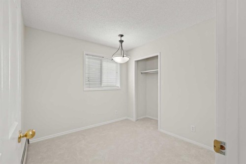 107 Tararidge Close Ne, Calgary, AB - Indoor Photo Showing Other Room