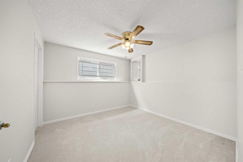 107 Tararidge Close Ne, Calgary, AB - Indoor Photo Showing Other Room