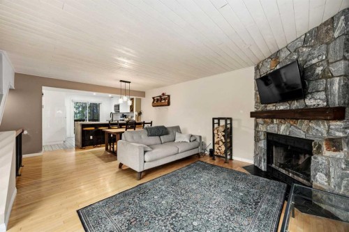 1-1061 Evergreen Circle, Canmore, AB - Indoor Photo Showing Living Room With Fireplace