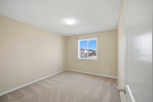 35 Saddlebrook Link Ne, Calgary, AB - Indoor Photo Showing Other Room