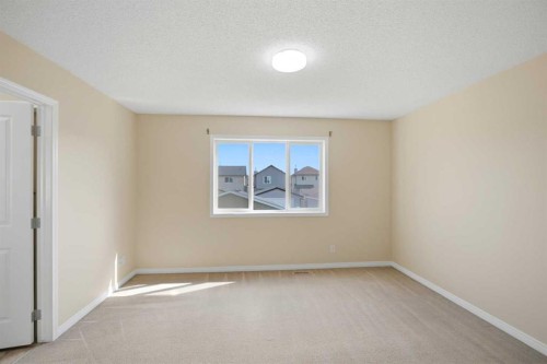 35 Saddlebrook Link Ne, Calgary, AB - Indoor Photo Showing Other Room
