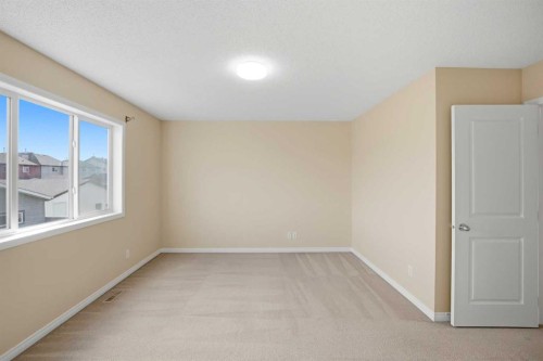 35 Saddlebrook Link Ne, Calgary, AB - Indoor Photo Showing Other Room