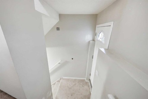 35 Saddlebrook Link Ne, Calgary, AB - Indoor Photo Showing Other Room