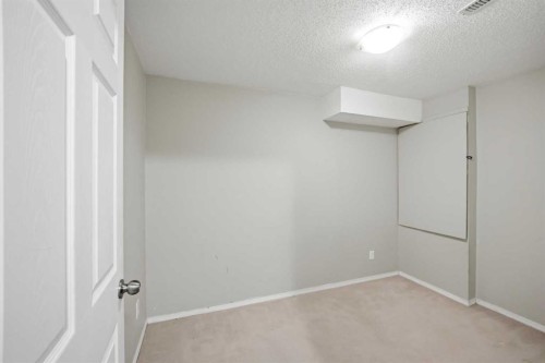 35 Saddlebrook Link Ne, Calgary, AB - Indoor Photo Showing Other Room