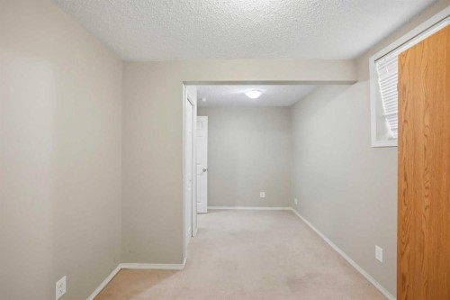 35 Saddlebrook Link Ne, Calgary, AB - Indoor Photo Showing Other Room