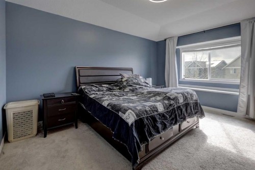 5 Williamstown Park Nw, Airdrie, AB - Indoor Photo Showing Bedroom