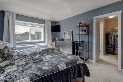 5 Williamstown Park Nw, Airdrie, AB - Indoor Photo Showing Bedroom