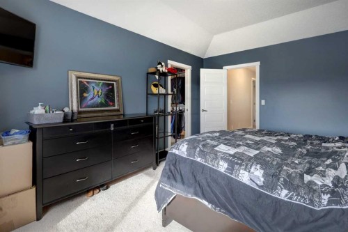 5 Williamstown Park Nw, Airdrie, AB - Indoor Photo Showing Bedroom