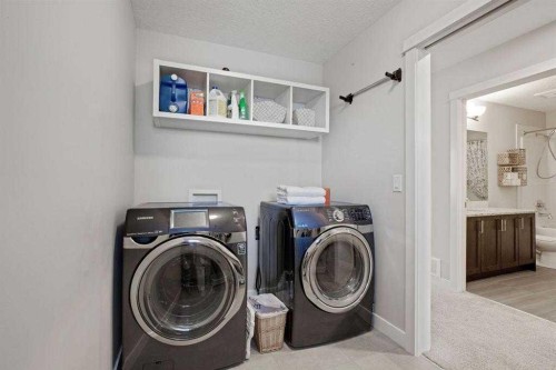 5 Williamstown Park Nw, Airdrie, AB - Indoor Photo Showing Laundry Room