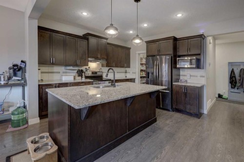 5 Williamstown Park Nw, Airdrie, AB - Indoor Photo Showing Kitchen With Upgraded Kitchen