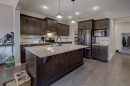 5 Williamstown Park Nw, Airdrie, AB  - Indoor Photo Showing Kitchen With Upgraded Kitchen 