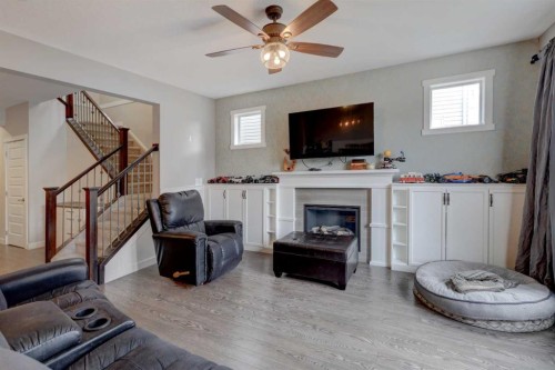 5 Williamstown Park Nw, Airdrie, AB - Indoor With Fireplace