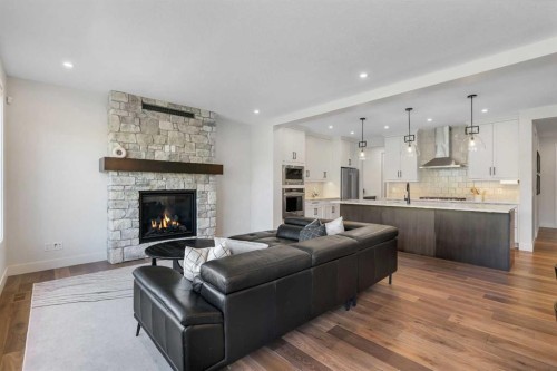 236 Marina Grove Se, Calgary, AB - Indoor Photo Showing Living Room With Fireplace