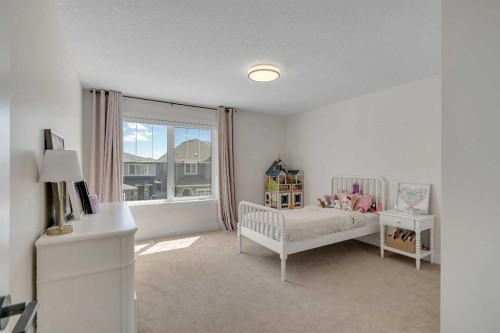 236 Marina Grove Se, Calgary, AB - Indoor Photo Showing Bedroom