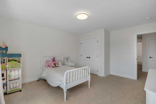 236 Marina Grove Se, Calgary, AB - Indoor Photo Showing Bedroom