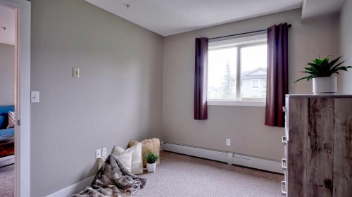 3309-403 Mackenzie Way Sw, Airdrie, AB 