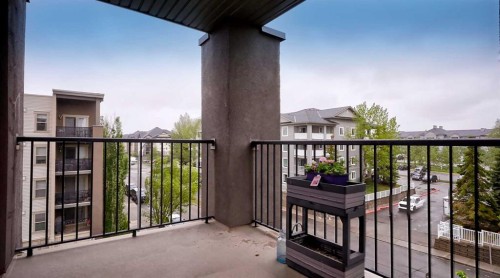 3309-403 Mackenzie Way Sw, Airdrie, AB 