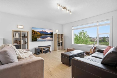 114 Cougarstone Crescent Sw, Calgary, AB - Indoor Photo Showing Living Room