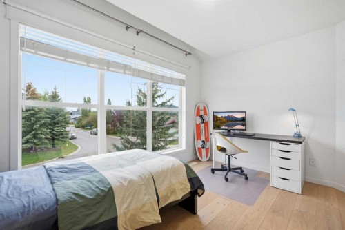 114 Cougarstone Crescent Sw, Calgary, AB - Indoor Photo Showing Bedroom