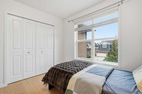 114 Cougarstone Crescent Sw, Calgary, AB - Indoor Photo Showing Bedroom