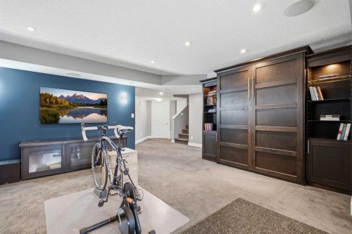 114 Cougarstone Crescent Sw, Calgary, AB - Indoor Photo Showing Other Room