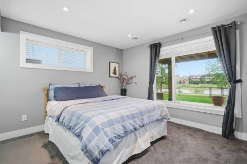 114 Cougarstone Crescent Sw, Calgary, AB - Indoor Photo Showing Bedroom
